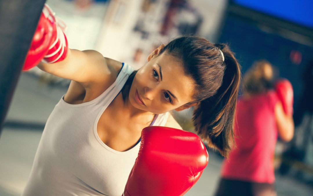 Female Boxer At Training